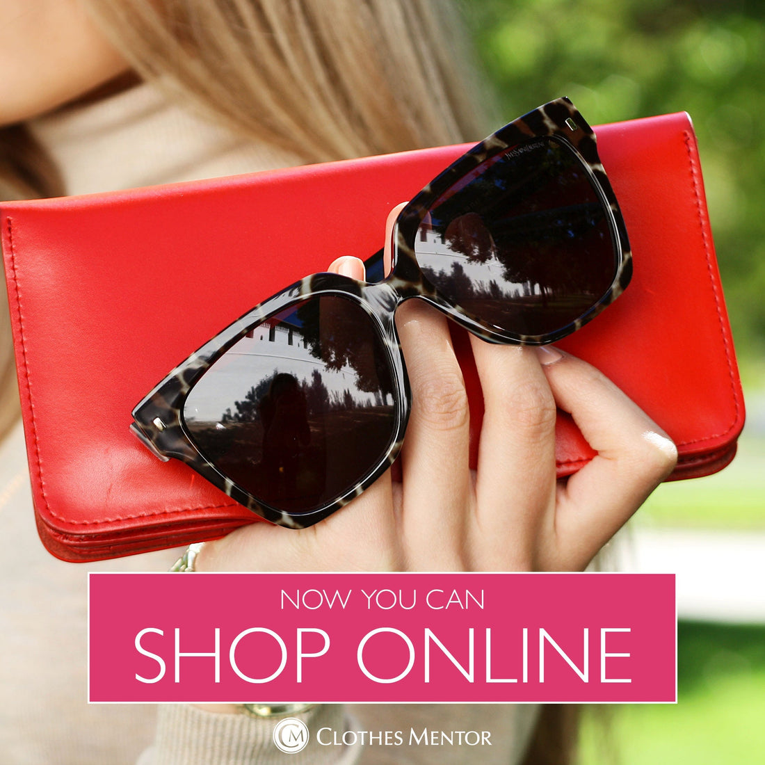 Sunglasses and Wallet in a Woman's hand